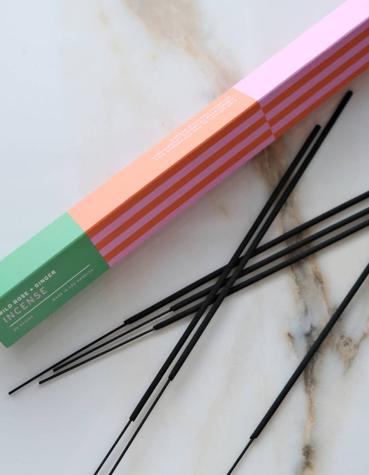 Botanica Wild Rose + Ginger incense sticks beside their box