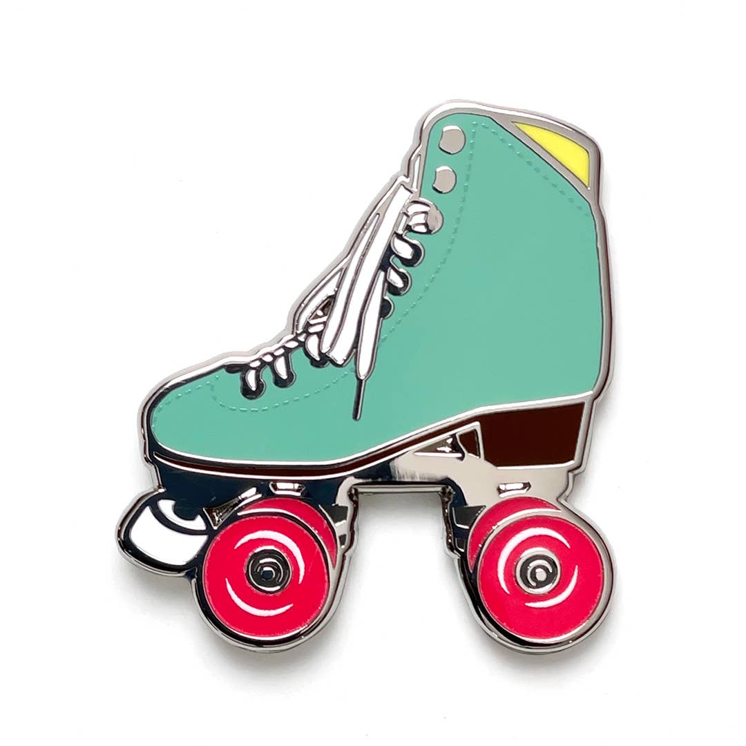 Sea Foam roller skate pin with glow in the dark wheels