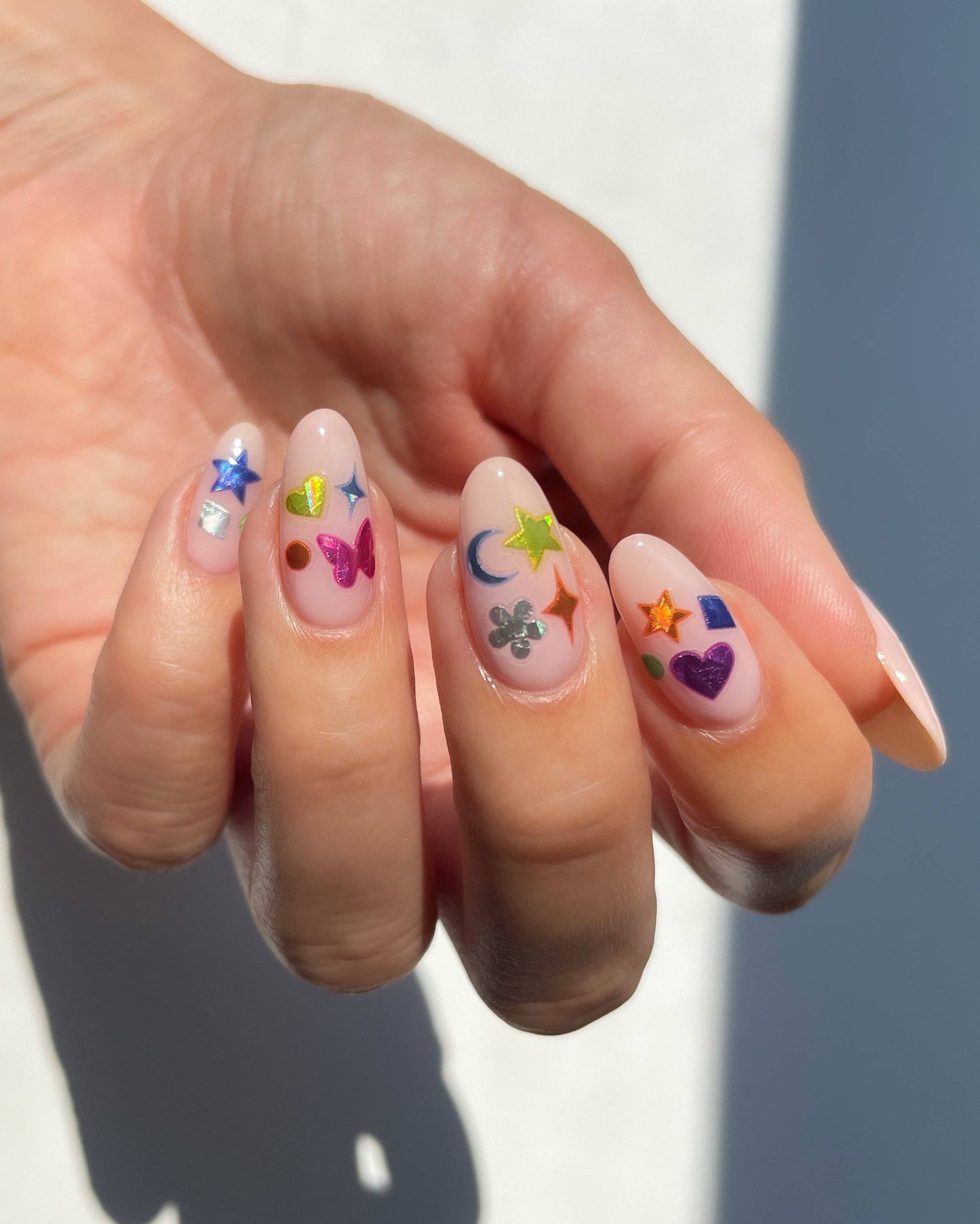Deco Beauty Confetti holographic nail stickers in tiny party shapes