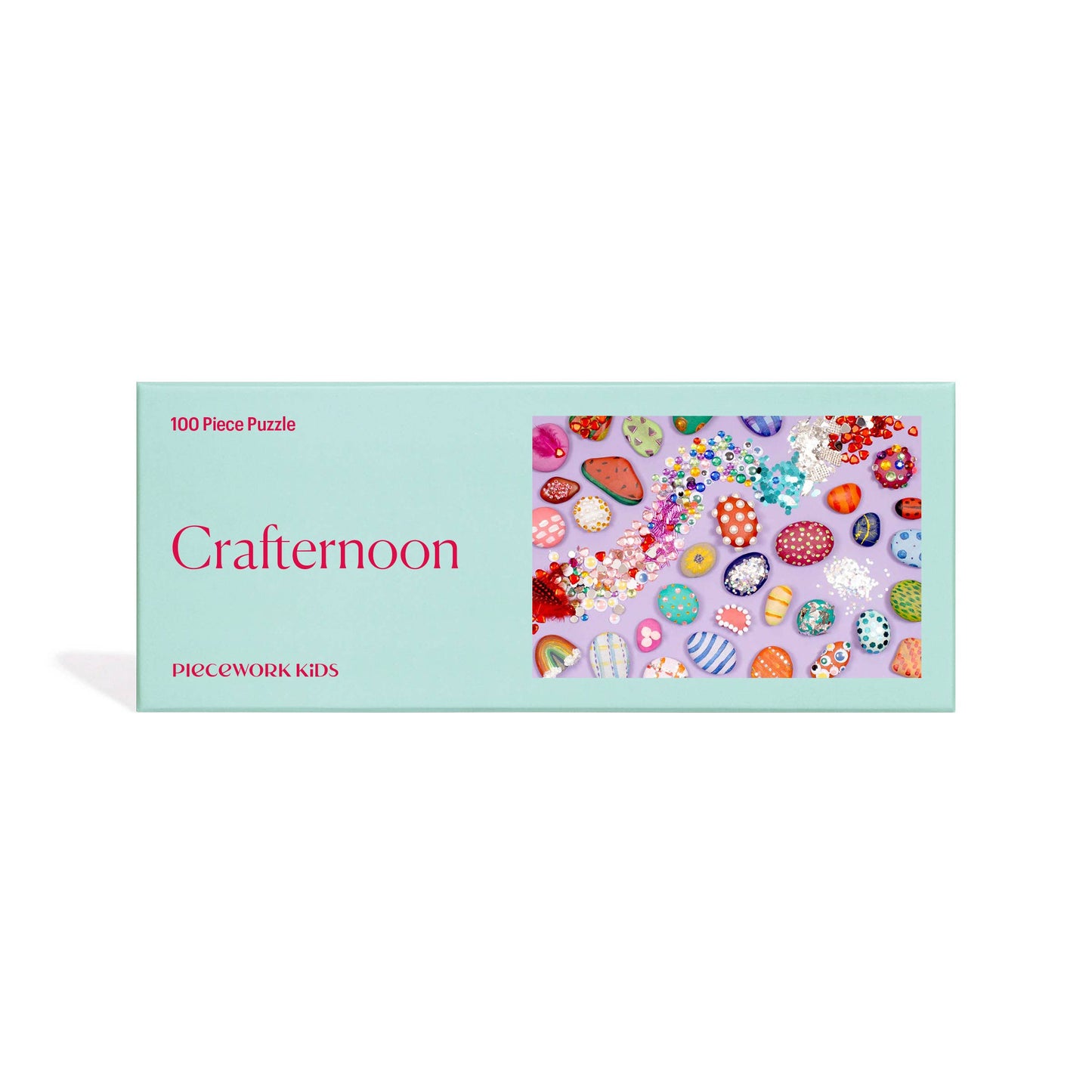 Completed Crafternoon puzzle: a playful spread of sparkles, googly eyes, and characterful rocks.