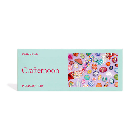Completed Crafternoon puzzle: a playful spread of sparkles, googly eyes, and characterful rocks.
