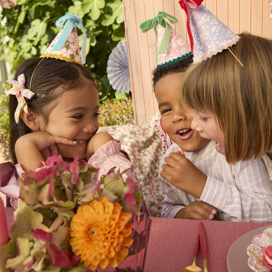 Liberty party hats showing the coordinating velvet ricrac edging