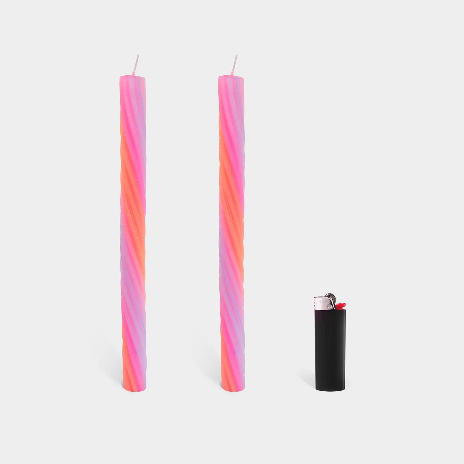 Pair of orange rope taper candles, 11 inches tall