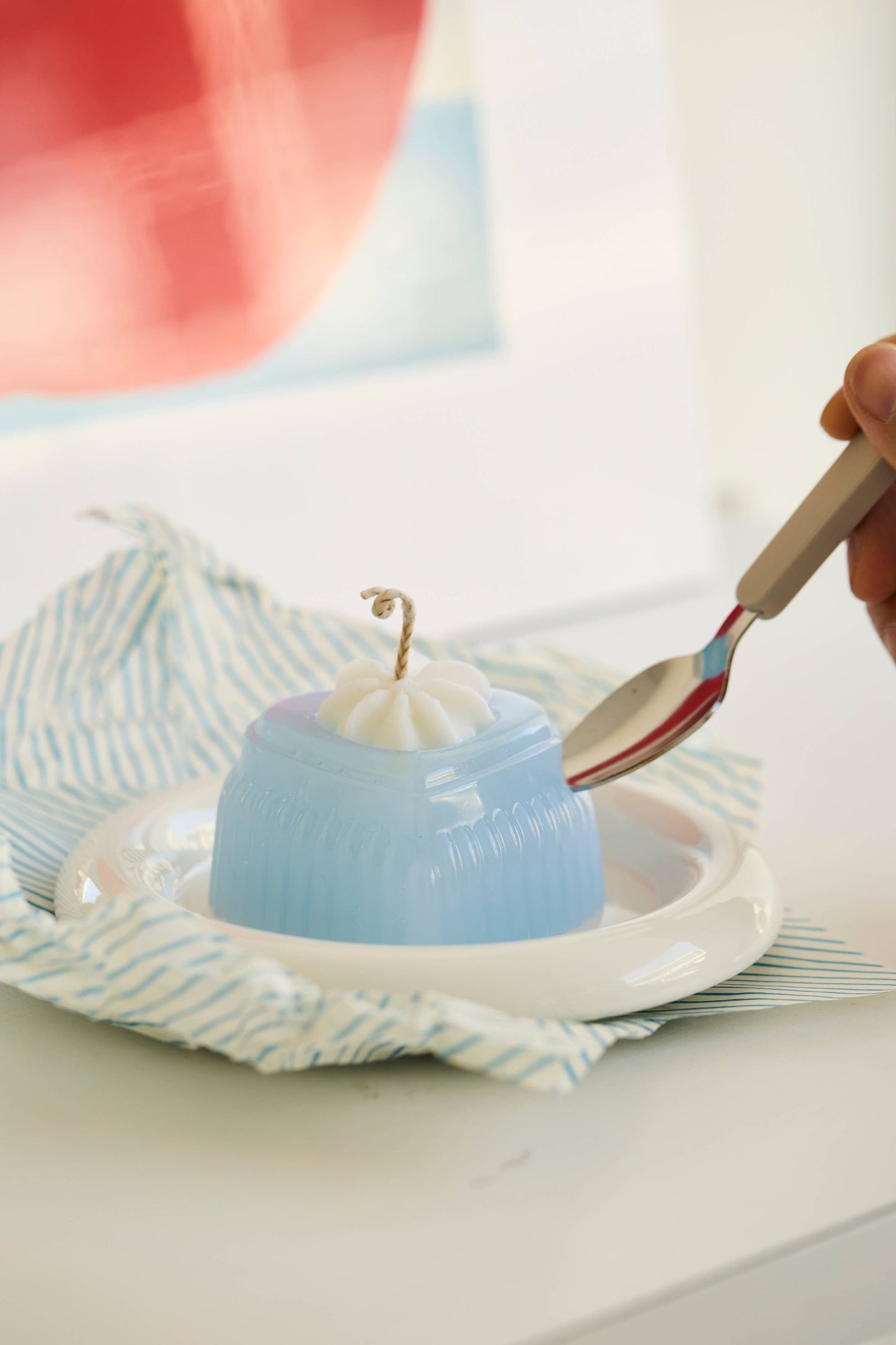 The blue heart Adoration candle, which has a hidden heart set inside.