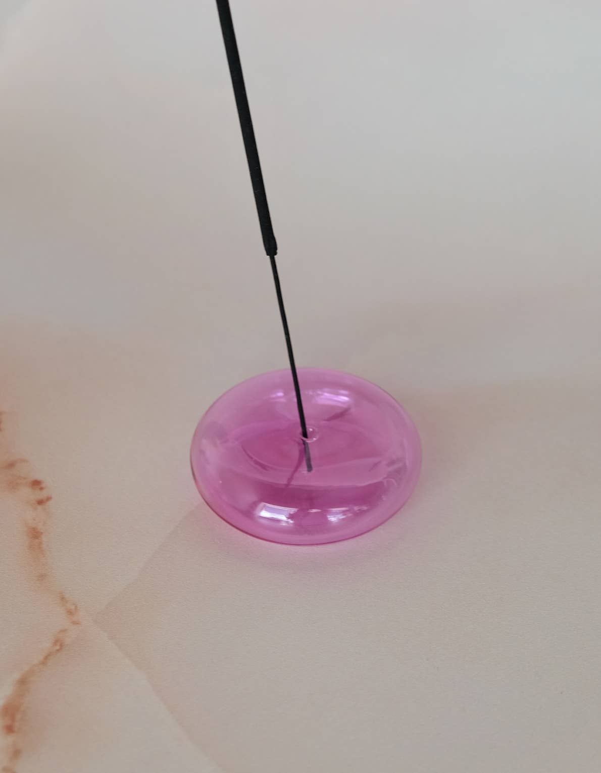 Handblown bubble glass incense holder in translucent colored glass