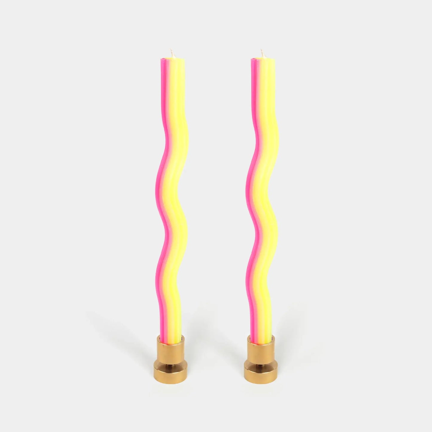 Two wavy wiggle taper candles in yellow and pink by 54 Celsius