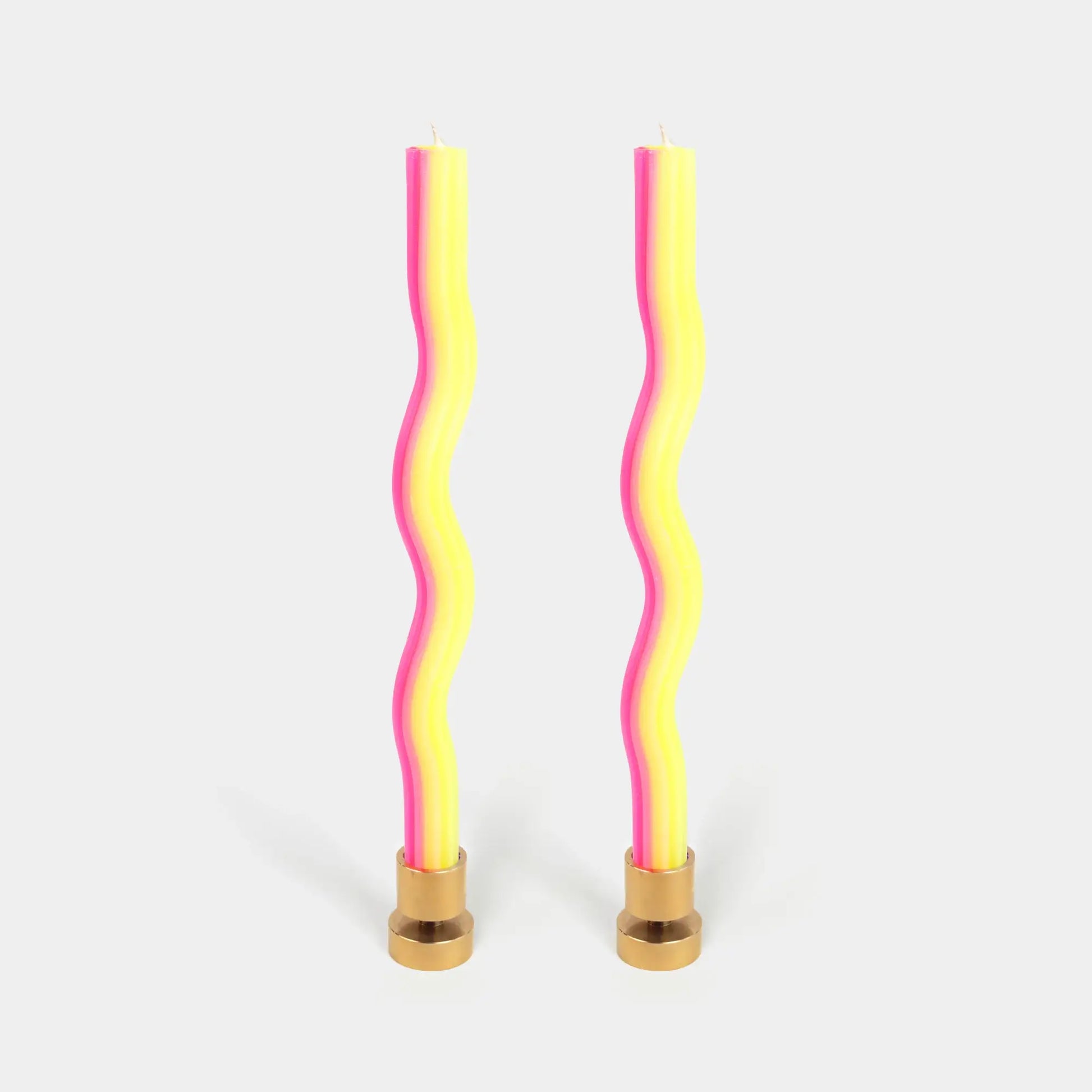 Two wavy wiggle taper candles in yellow and pink by 54 Celsius