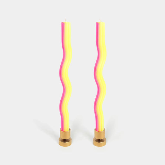 Two wavy wiggle taper candles in yellow and pink by 54 Celsius