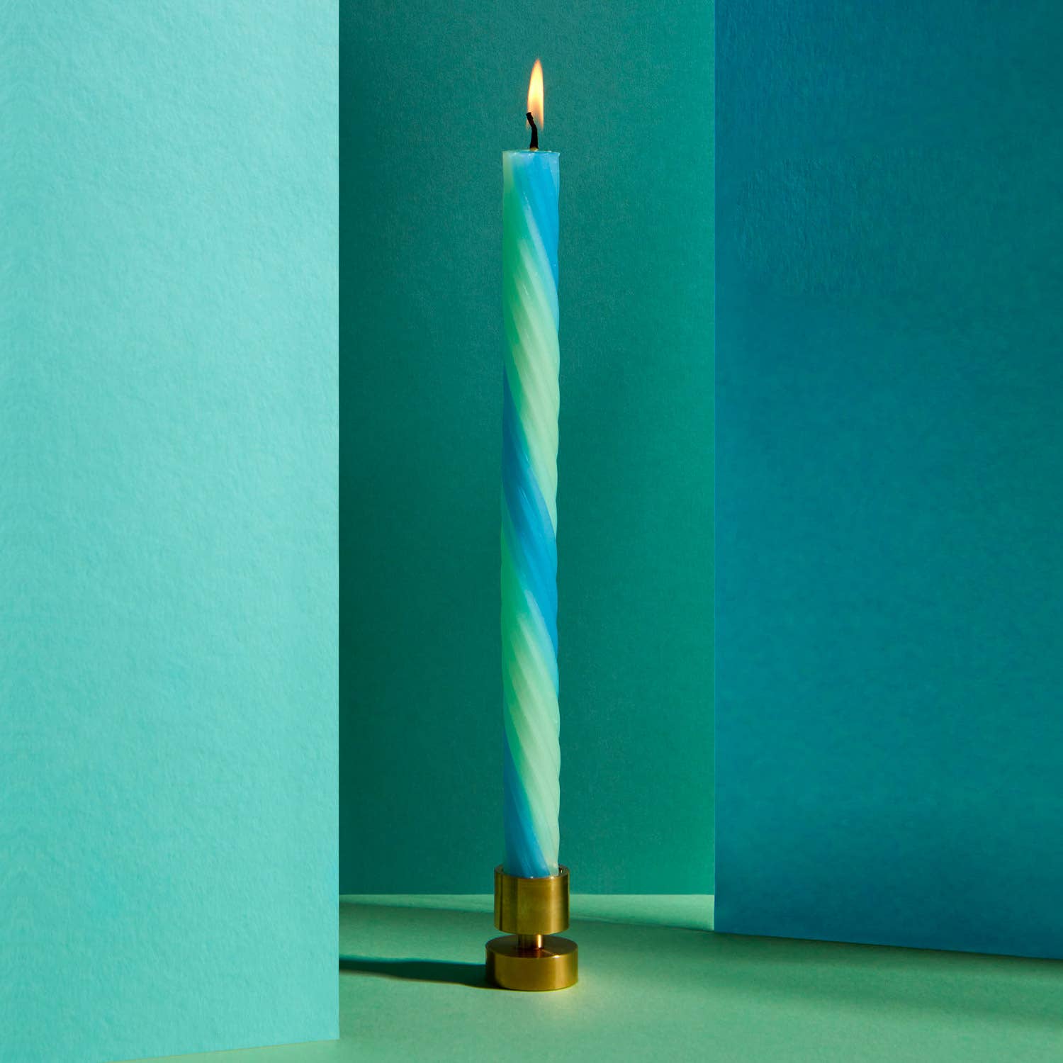 Mint rope taper candles showing the woven spiral texture