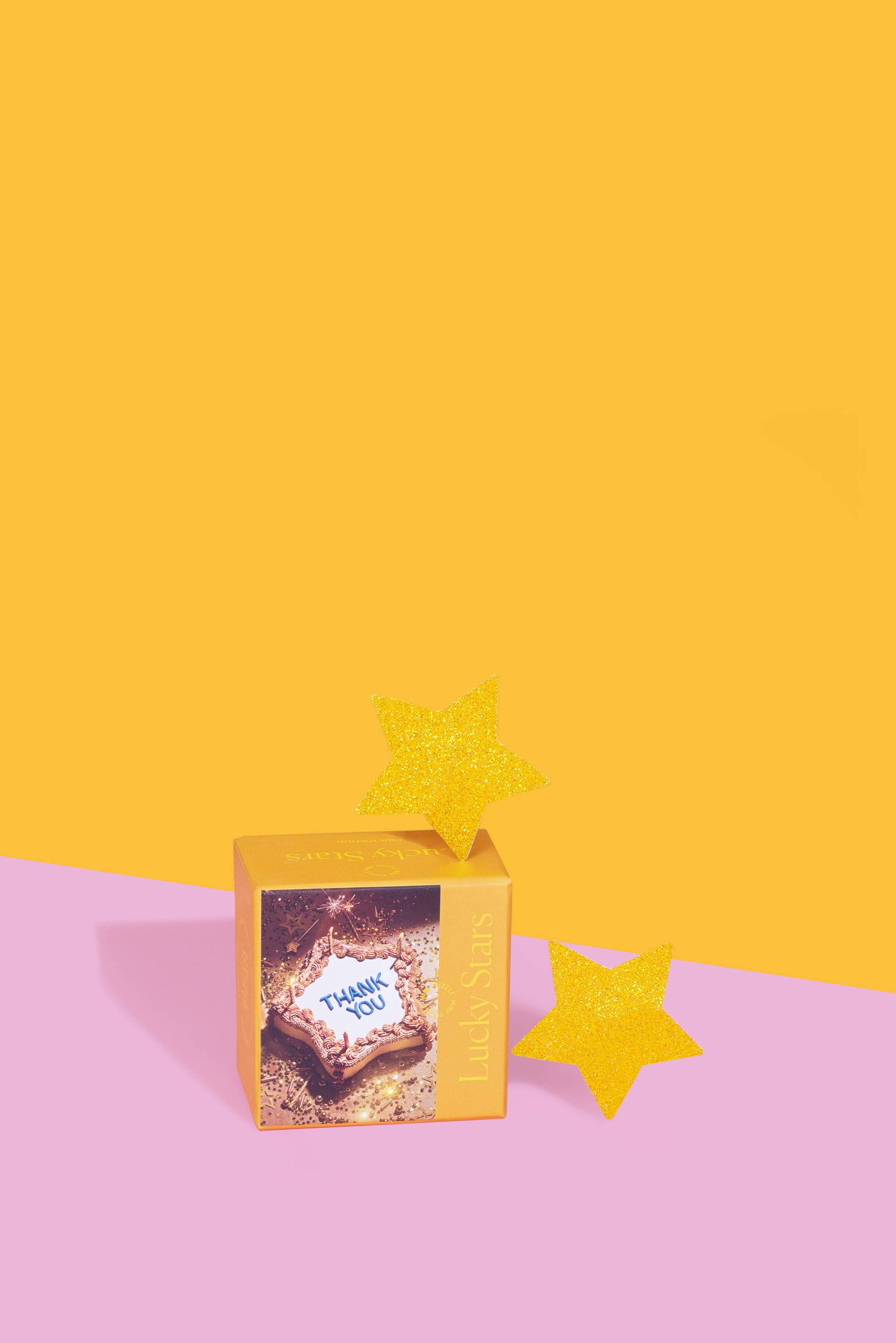 Completed Lucky Stars / Thank You mini puzzle featuring a star-shaped cake and sparkling stars.