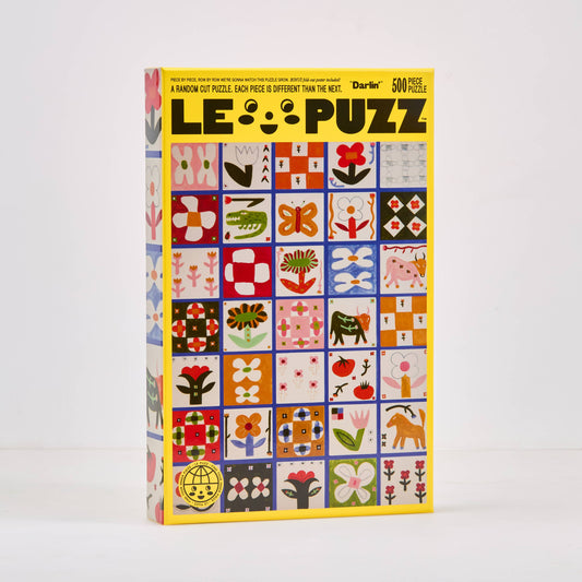 Puzzle box with a colorful tile pattern on a white background