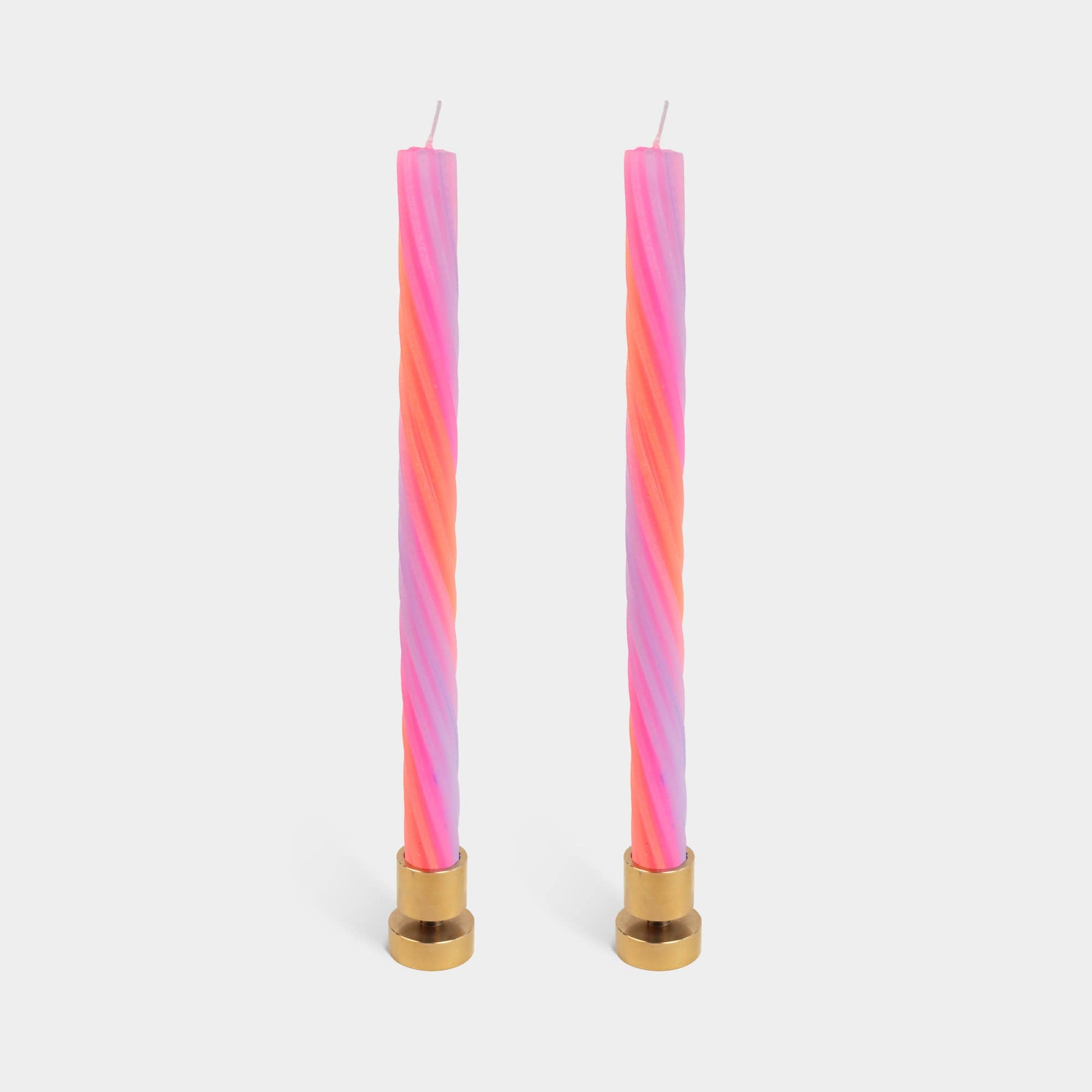 Two orange spiral rope taper candles by 54 Celsius