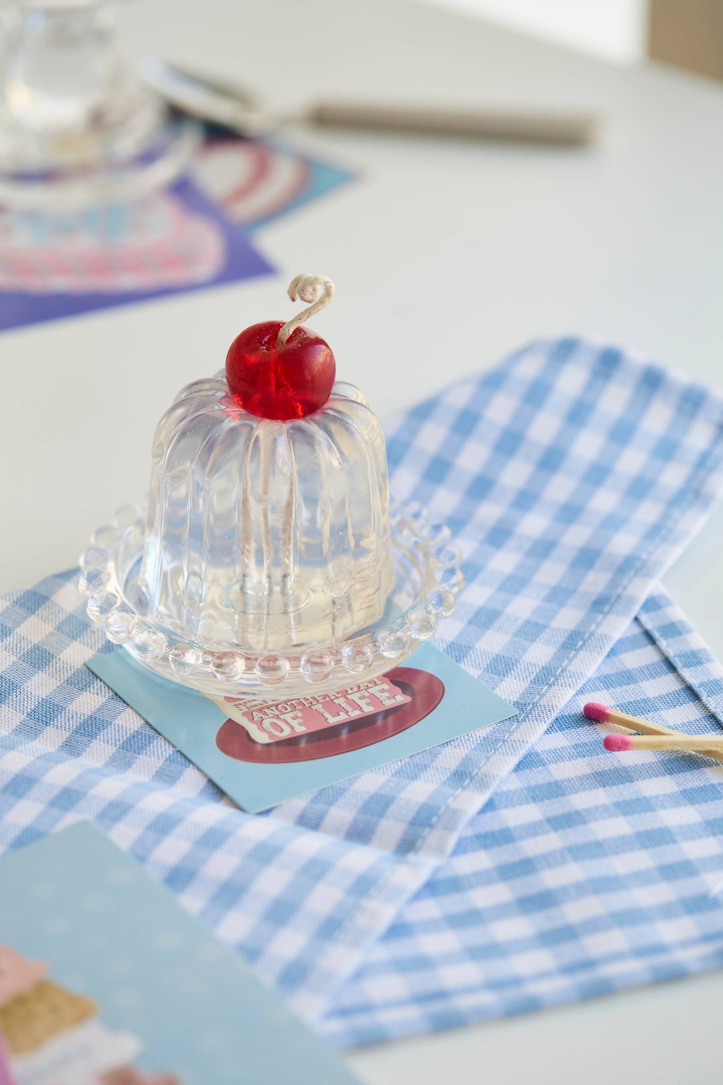 The Insight candle showing its fluted Canele form in clear jelly wax.