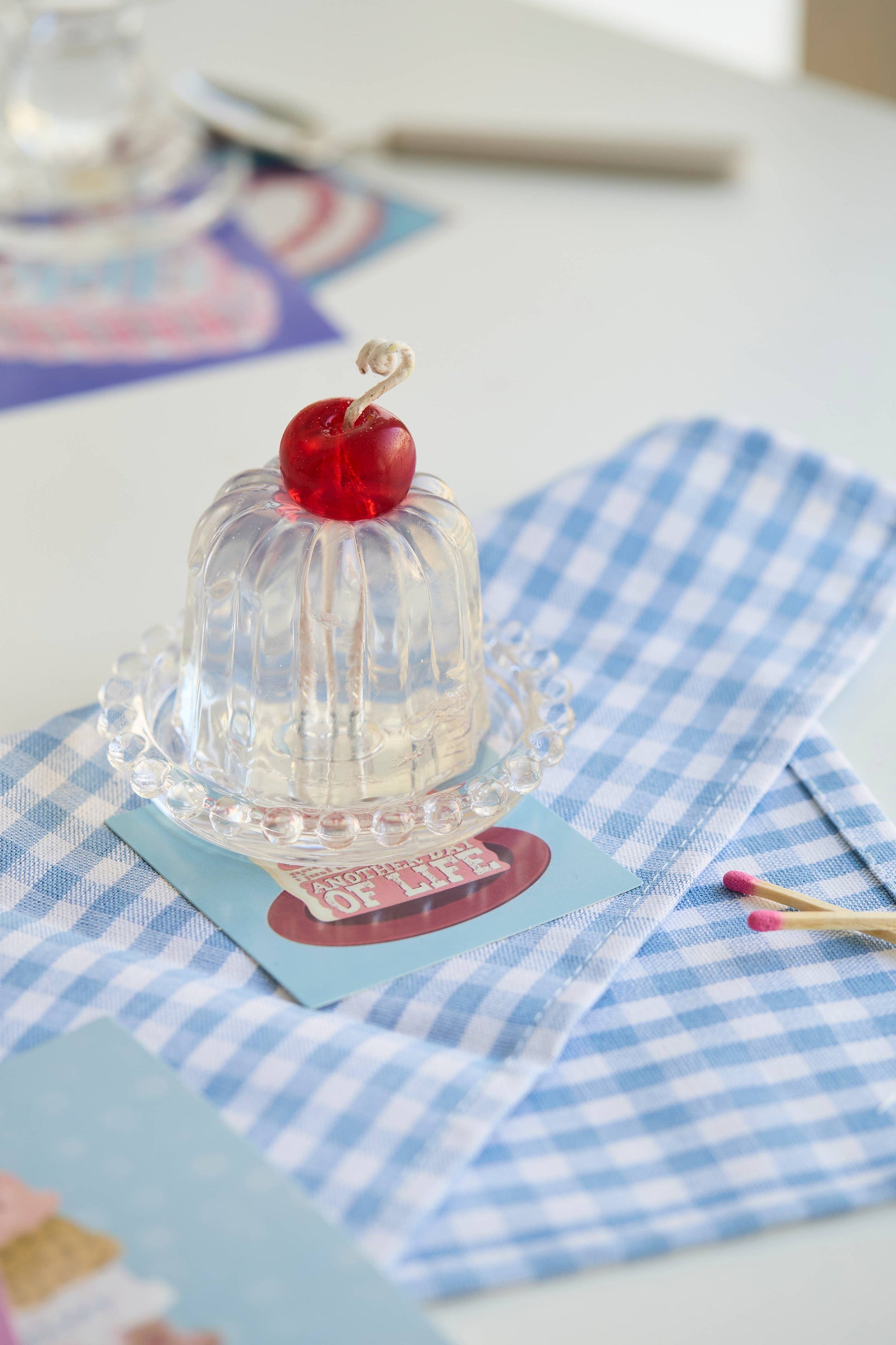 The Insight candle showing its fluted Canele form in clear jelly wax.