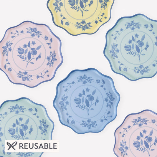Set of four vintage botanical melamine plates in mint, blue, pink, and yellow