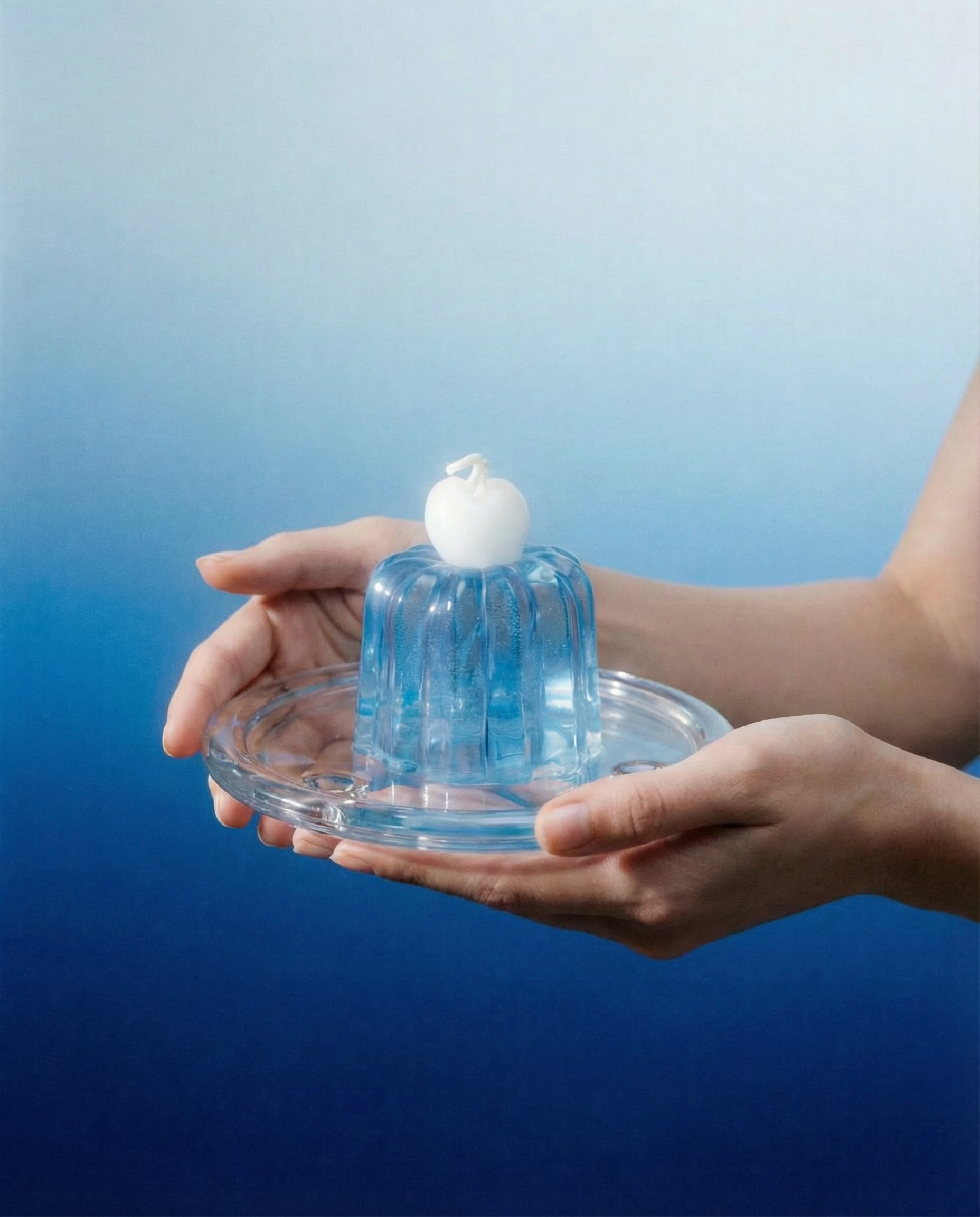 Crystal Ice Cube crystal-blue jelly wax cube candle, front product view.