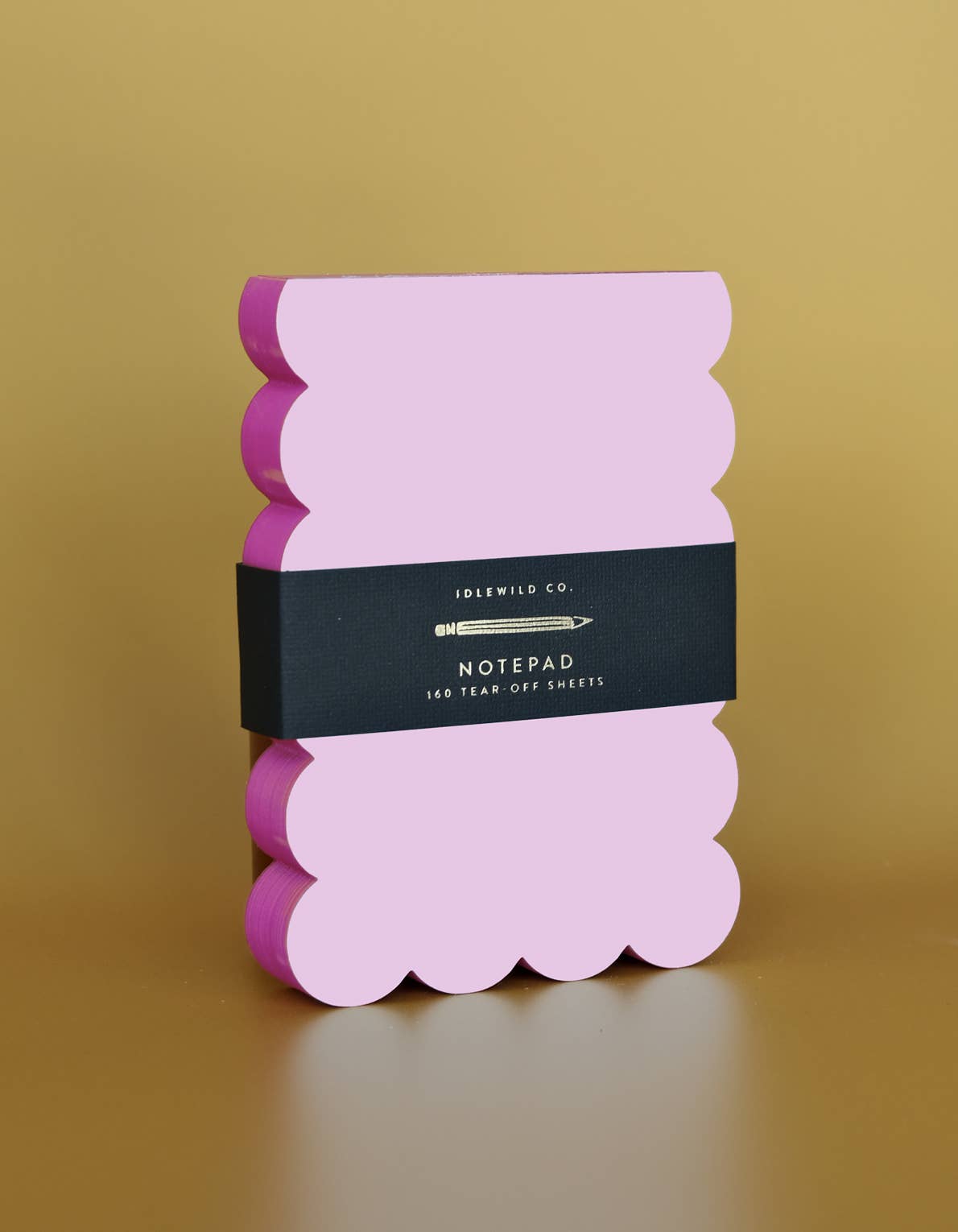 Scalloped die-cut notepad with lilac and hot pink painted edges