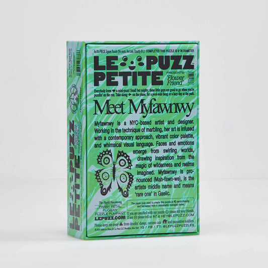 LE PUZZ PETITE packaging with text and a butterfly illustration on a white background
