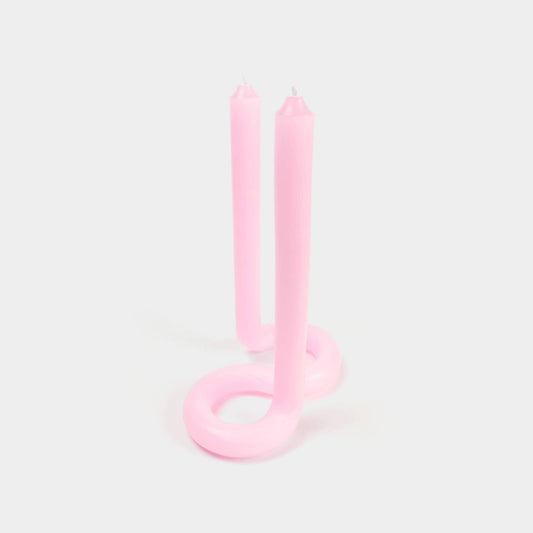 Light pink Twist candle stick by 54 Celsius, a double-ended twisted candle that stands on its own