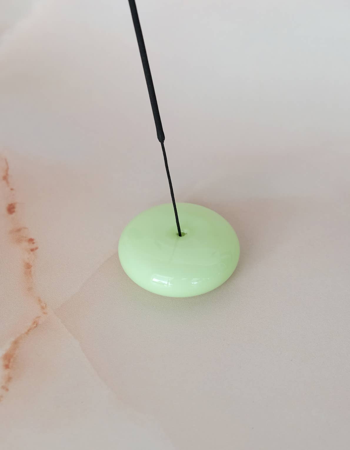 Bubble glass incense holder viewed from above