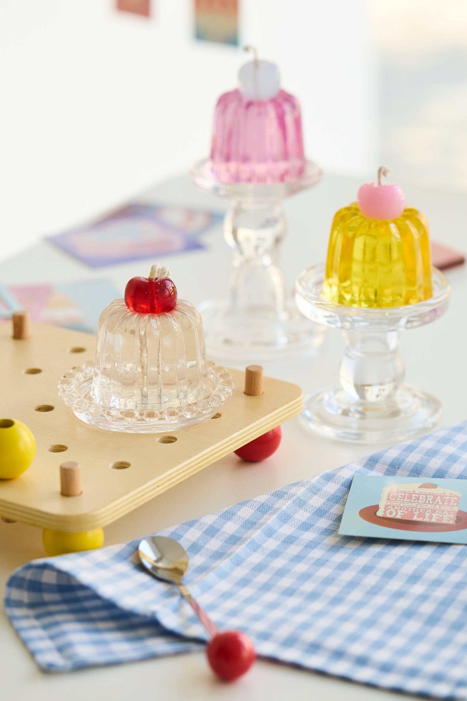 Insight clear jelly candle shaped like a fluted Canele pastry.
