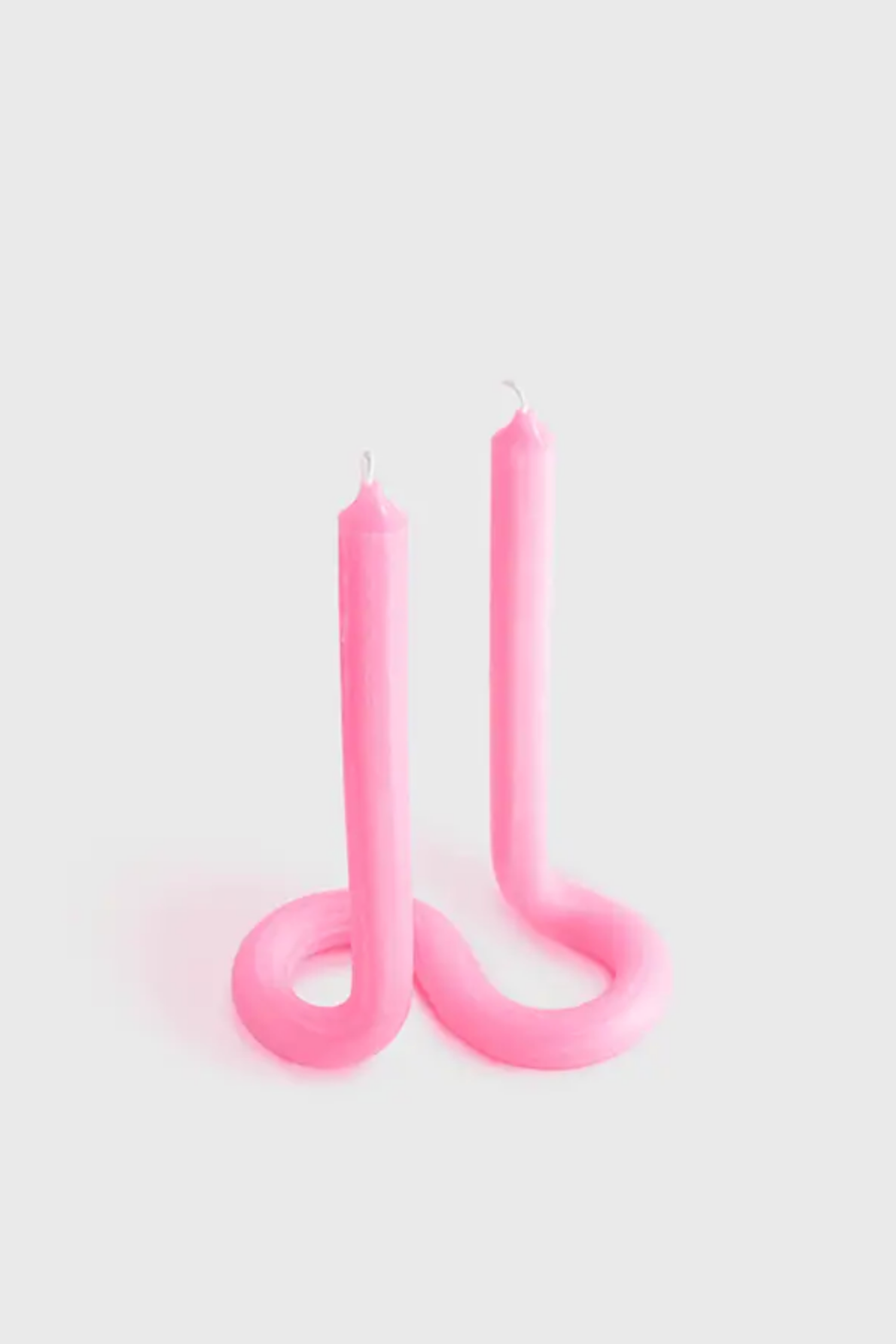 Flour pink Twist candle stick by 54 Celsius, a double-ended twisted candle that stands on its own