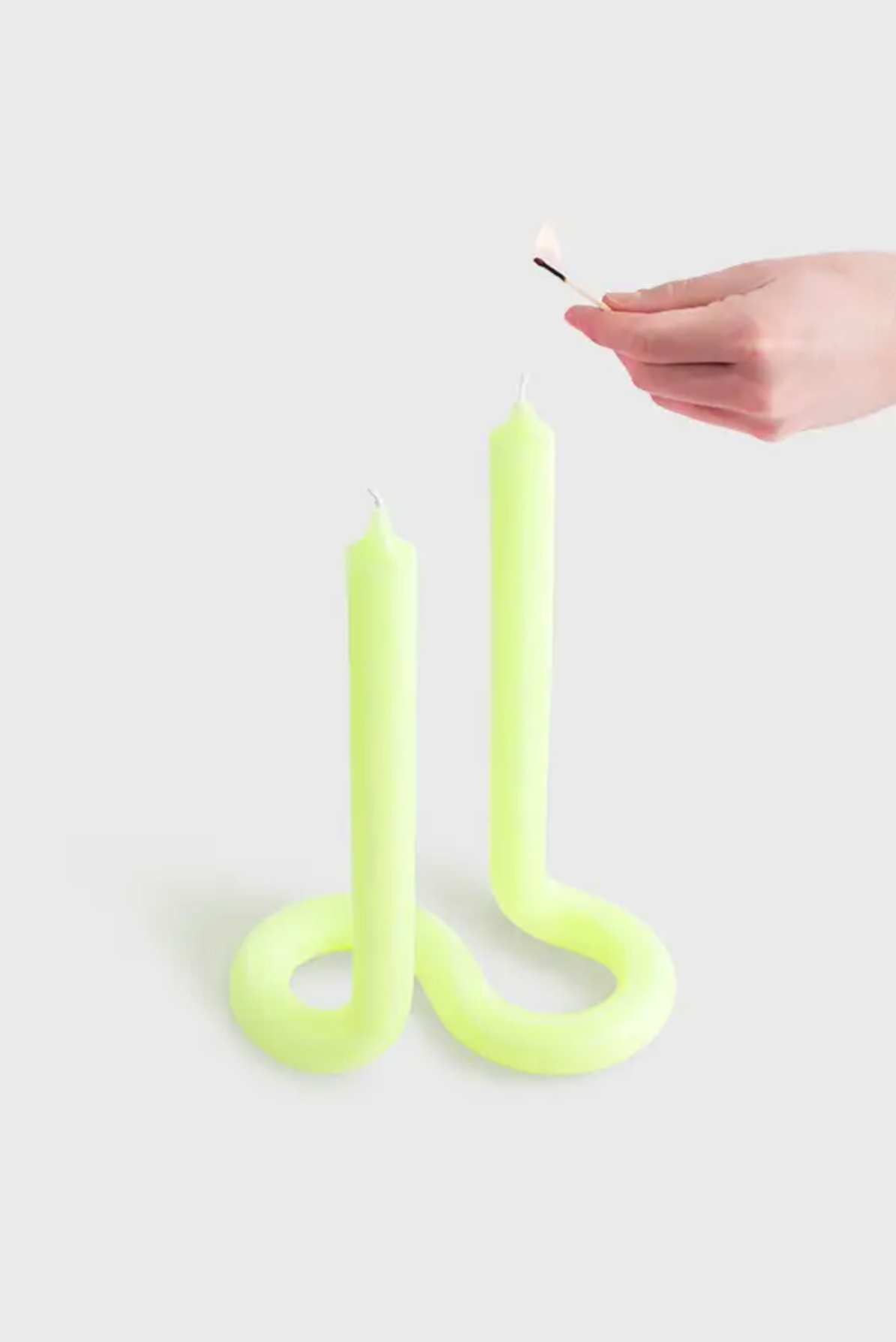 Yellow Twist candle stick by 54 Celsius, a double-ended twisted candle that stands on its own