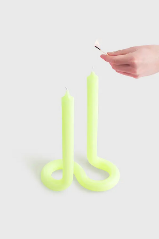 Yellow Twist candle stick by 54 Celsius, a double-ended twisted candle that stands on its own