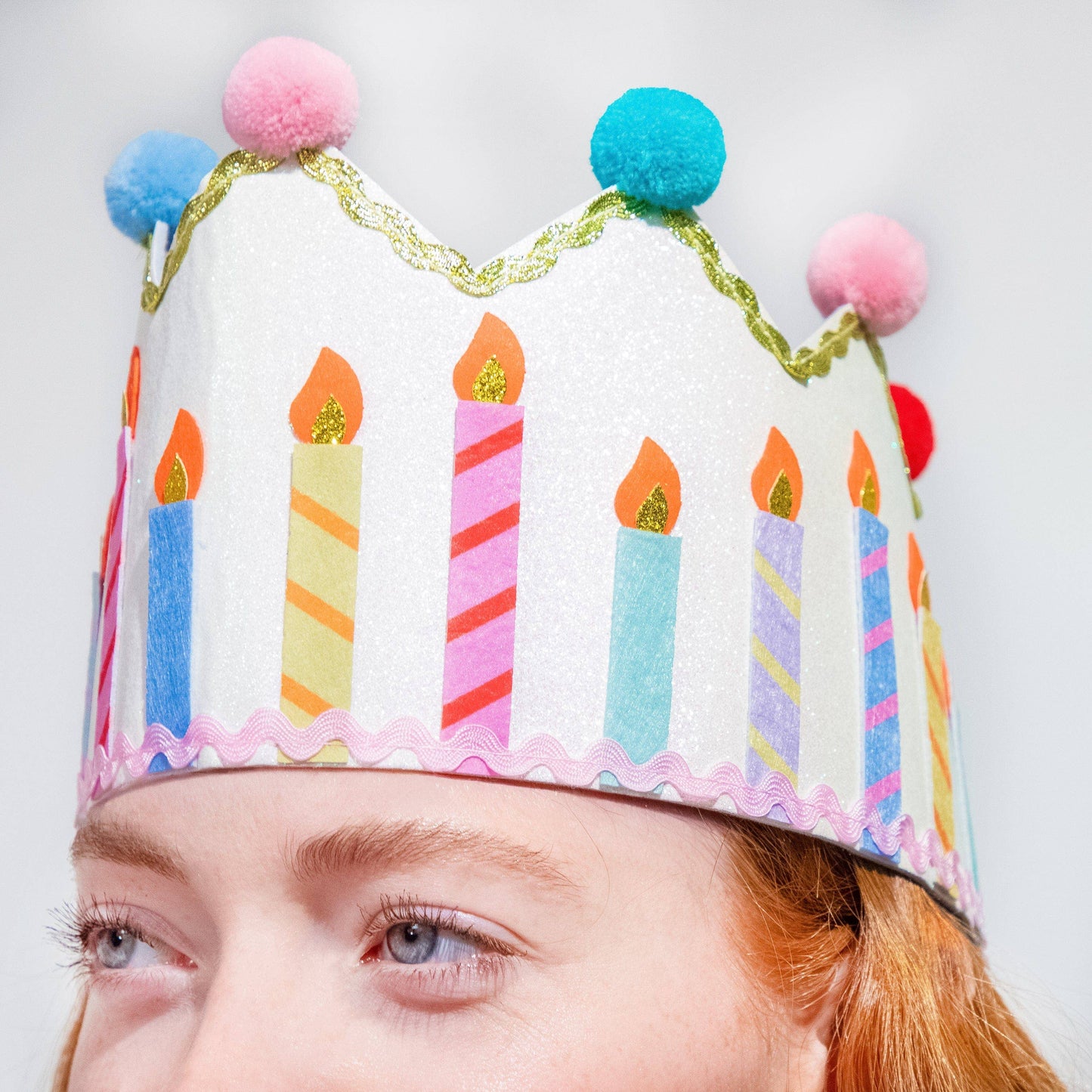 Reusable birthday crown in shimmering metallic glitter felt.