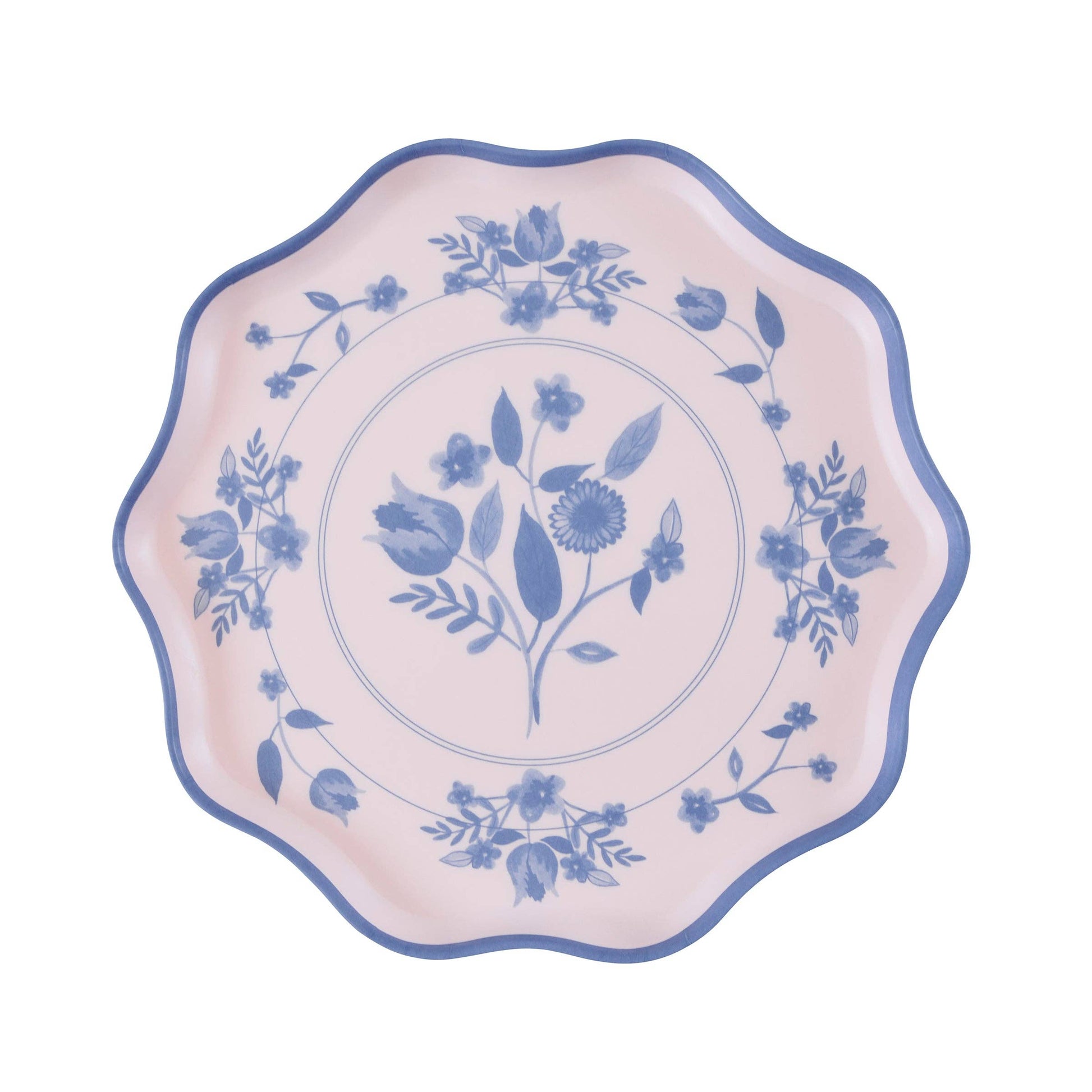 Stacked pastel botanical small plates with molded wavy edges