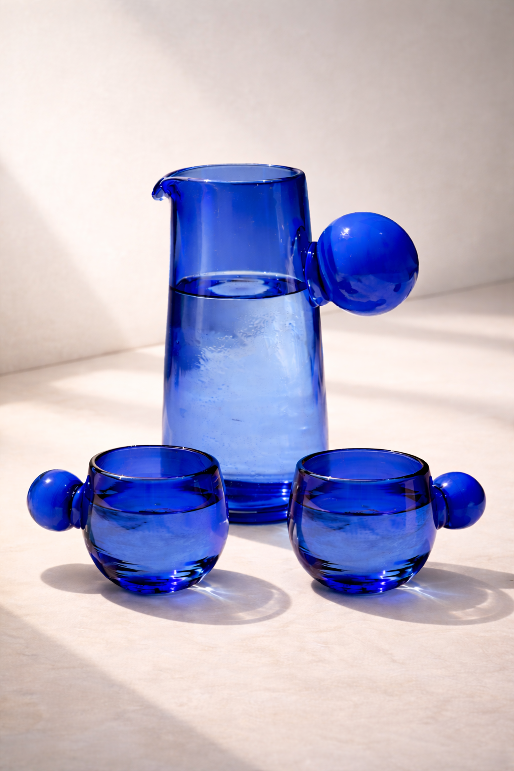 The Salinas set of four blue glasses shown together.