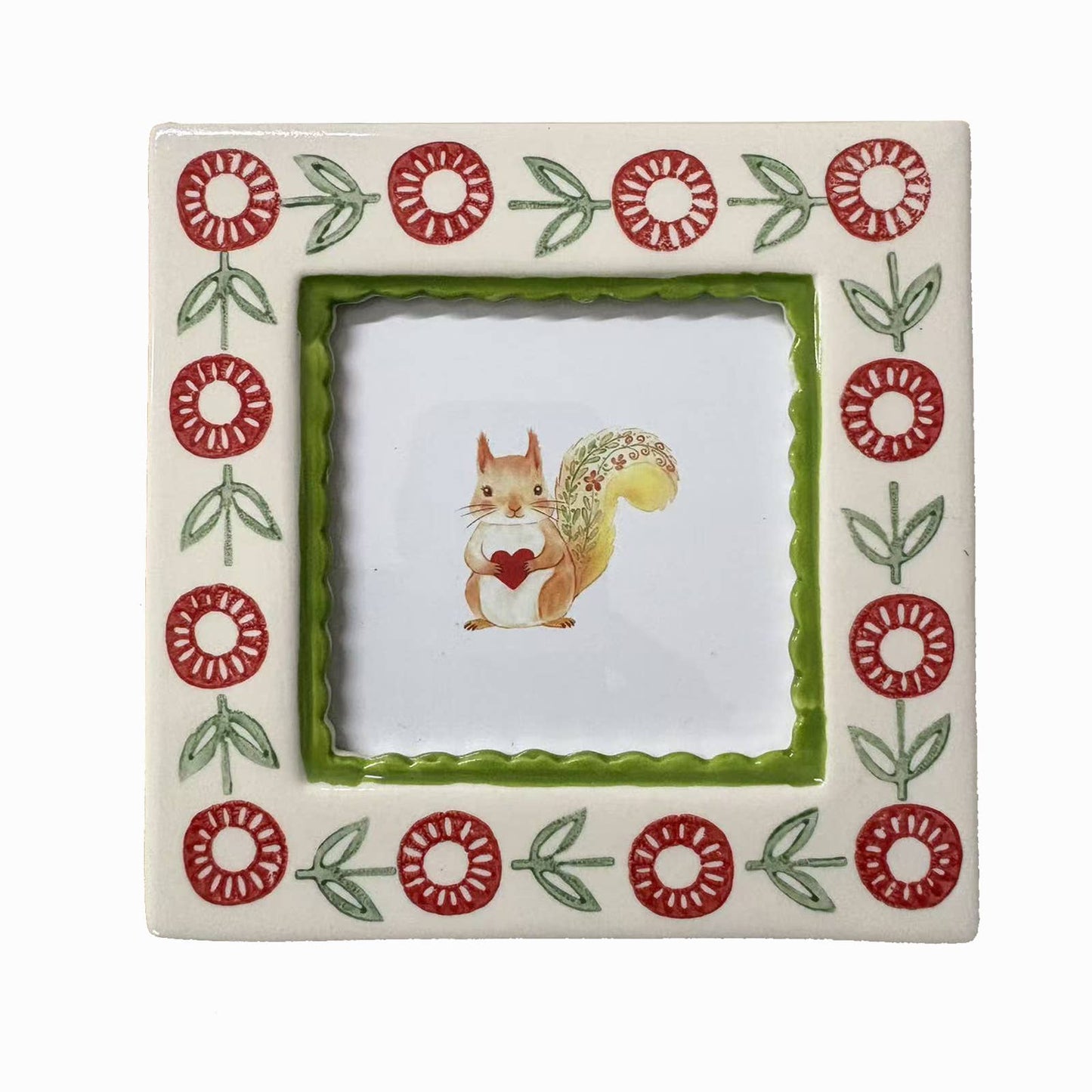 Square hand-painted ceramic photo frame with a green border and a small red-and-green floral pattern.