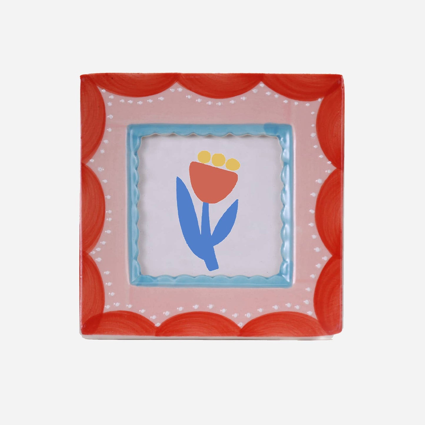 Square hand-painted ceramic photo frame with a red scalloped border.