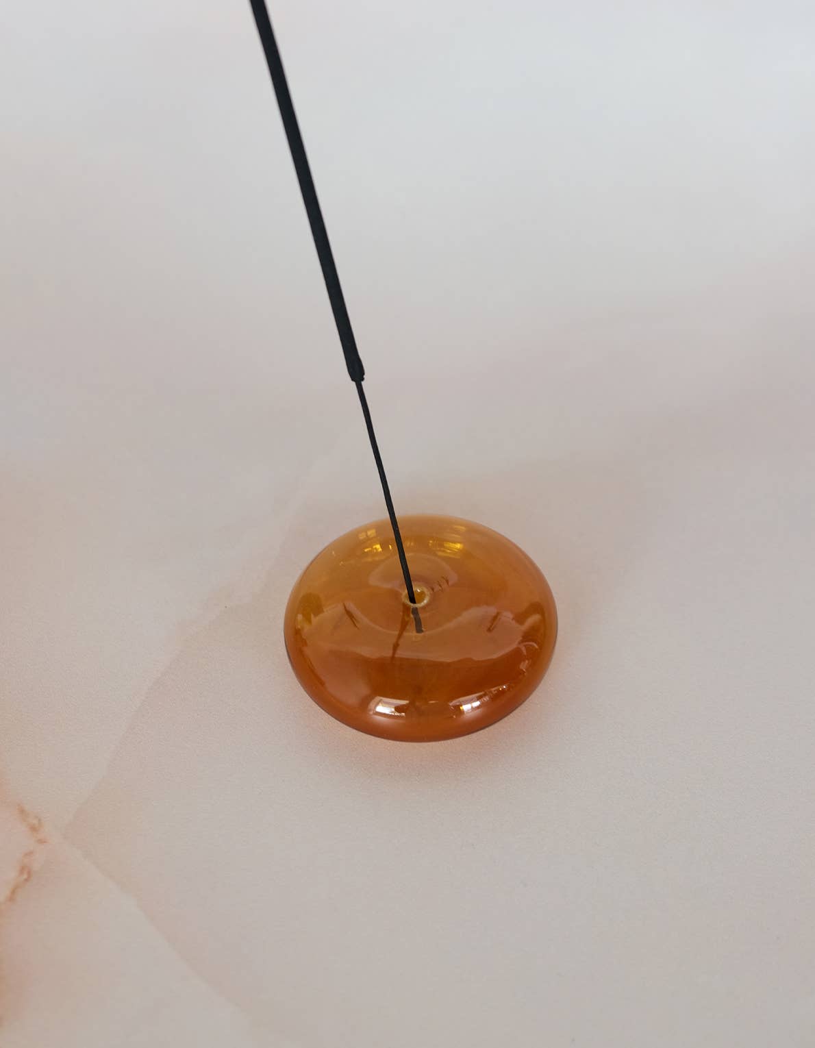 Handblown bubble glass incense holder in translucent colored glass