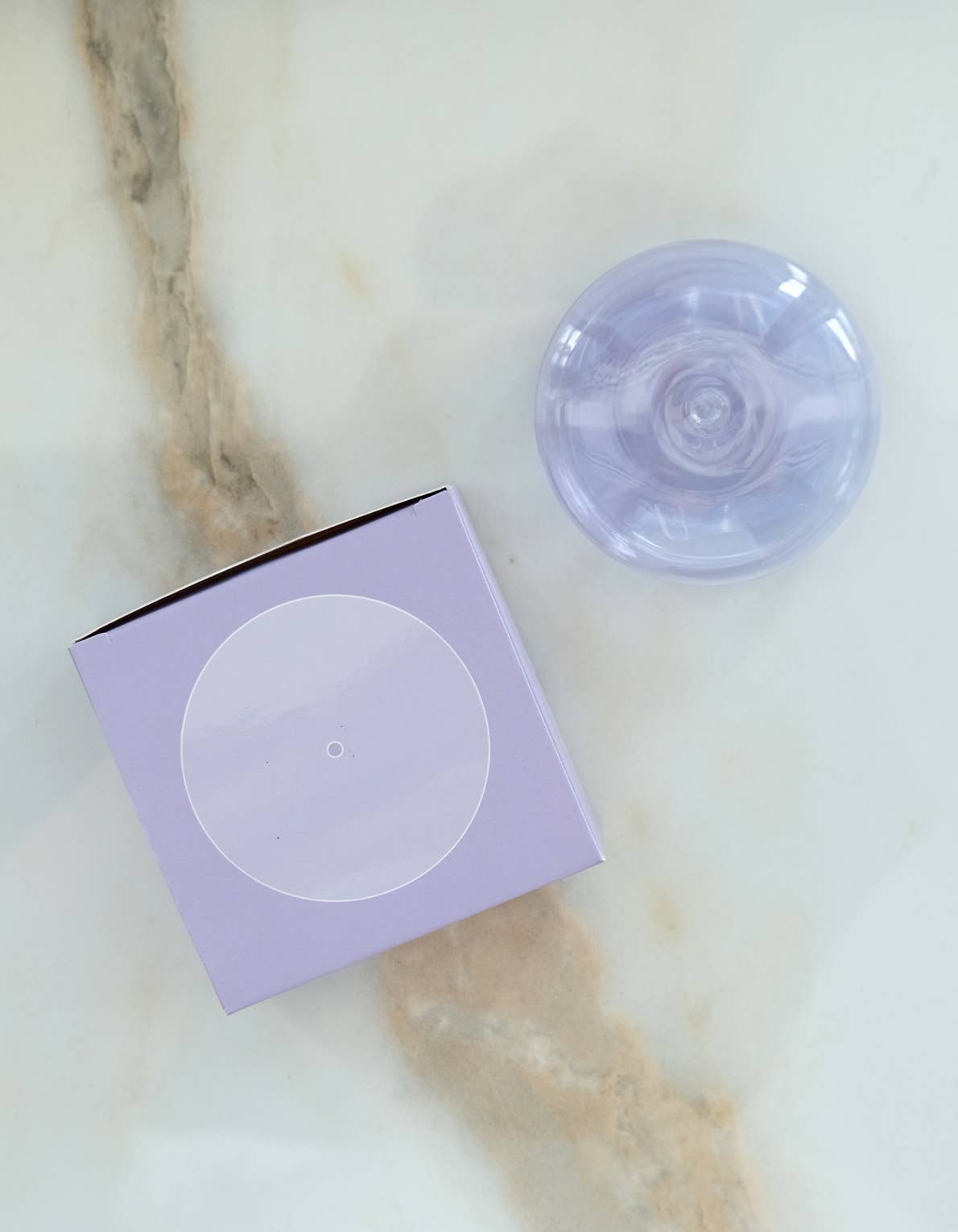 Bubble glass incense holders in an assortment of translucent colors