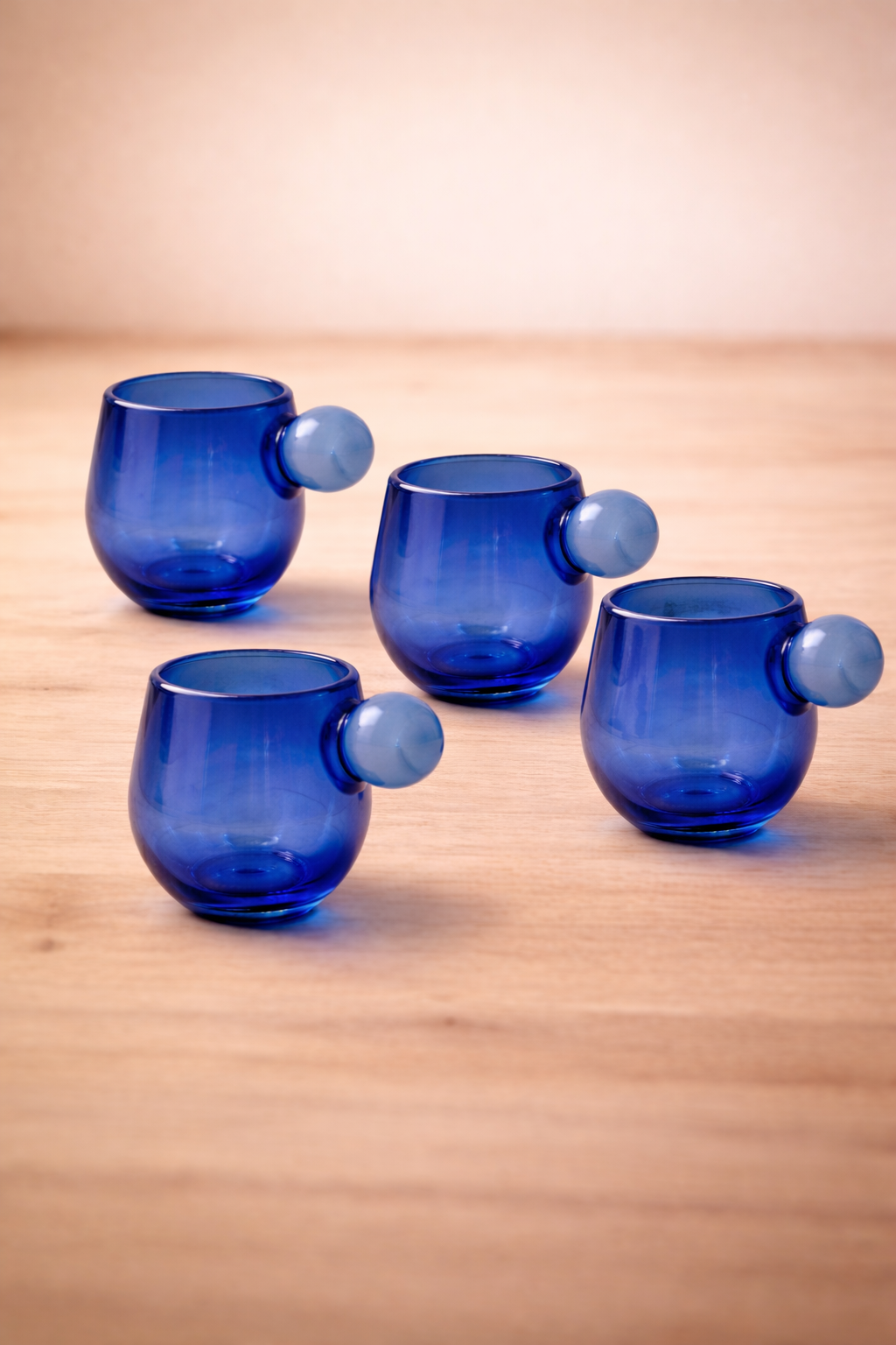 Salinas blue glasses arranged on a plain background.