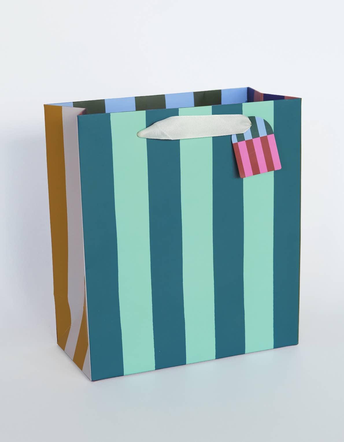 Striped gift bag with a padlock on a white background