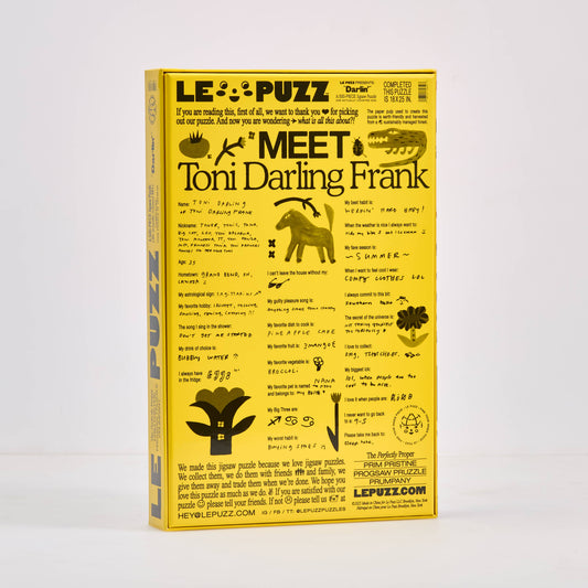 LE PUZZ puzzle box with a yellow and black design on a white background. 
